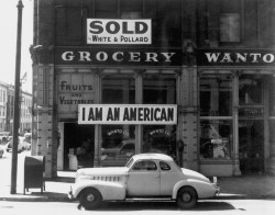 Photo by Dorothea Lange of Japanese-American grocery store on the day after Pearl Harbor